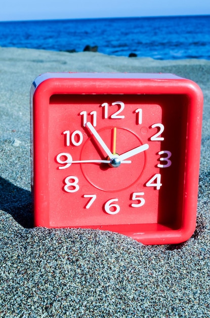 Clock on the Sand Beach