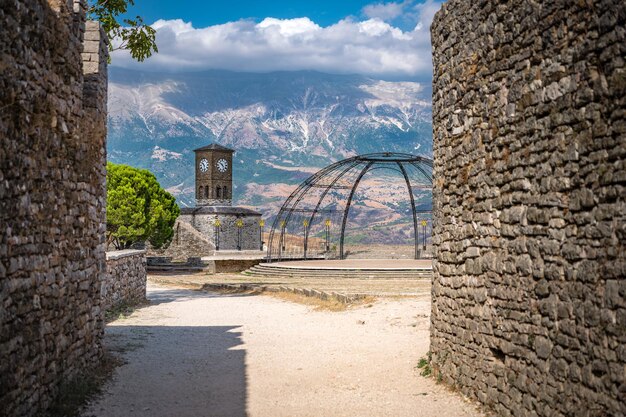 clock tower in gjirokaster citadel surrounded by ancient ruins attraction in albania europe