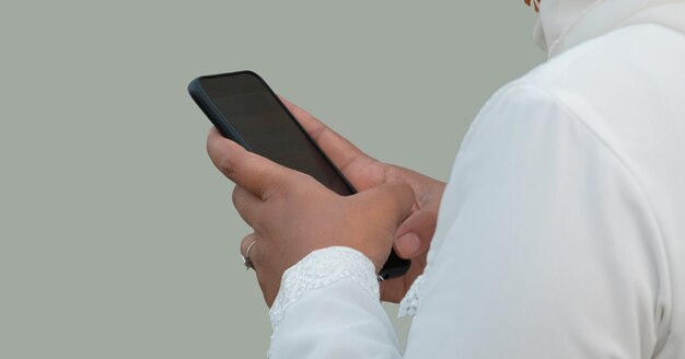 Close detail of woman hand holding phone