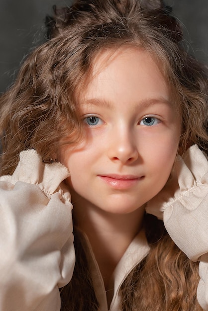 Close portrait of a girl with long hair at home