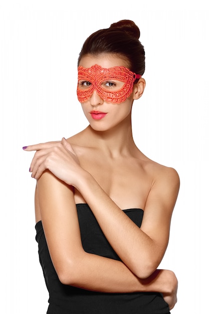 Close portrait of sexy lady in red lace mask