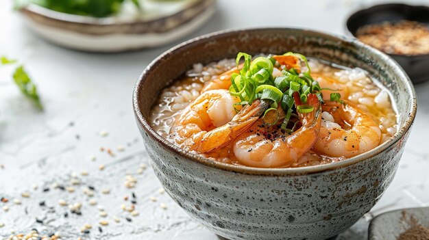 A close shot of a ceramic bowl filled with Congee with shrimps and fresh ginger against a clean surface with space for text or product advertisement Generative AI