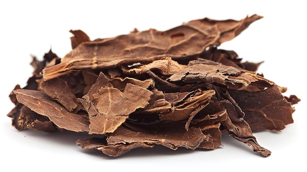 Close shot of a stack of dried tobacco on plain white backdrop with space for text or product advertisement Generative AI