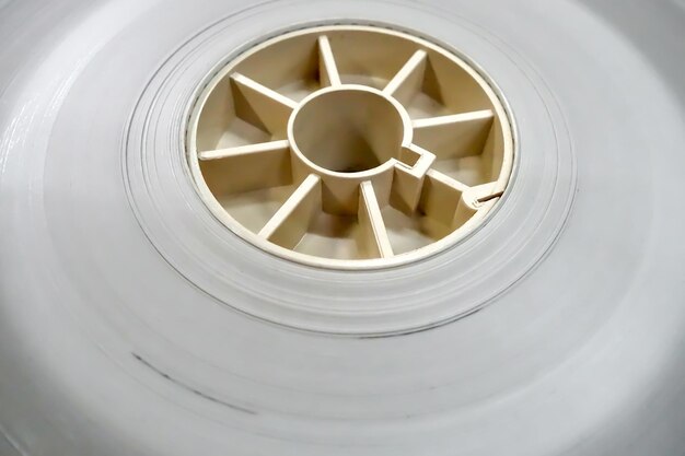 Close up a 35 mm film tape leader white color clear for film\
productions processing