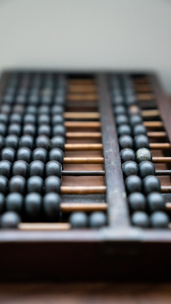 Photo close-up of abacus on table