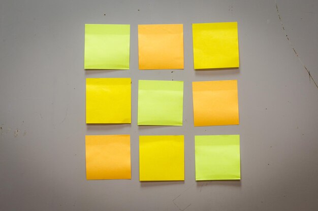 close-up of adhesive notes against wall