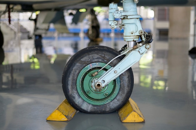 Close up of airplane wheel in an airfield