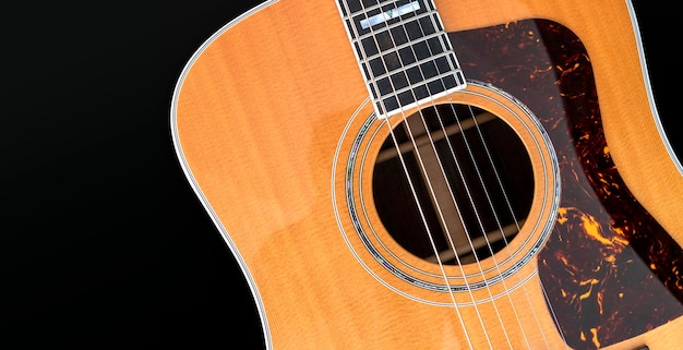 Close-up akoestische gitaar met softfocus en over licht op de achtergrond