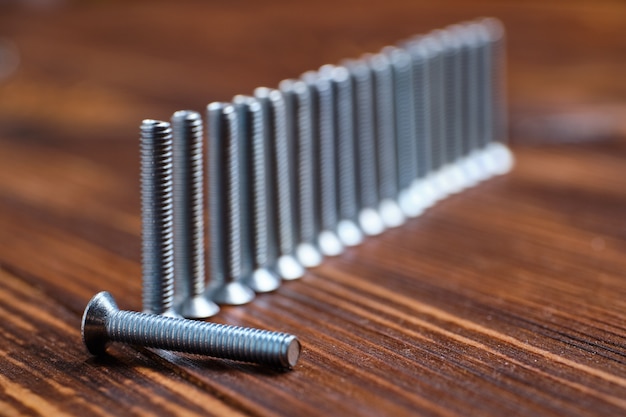 Close up on aligned metal screws