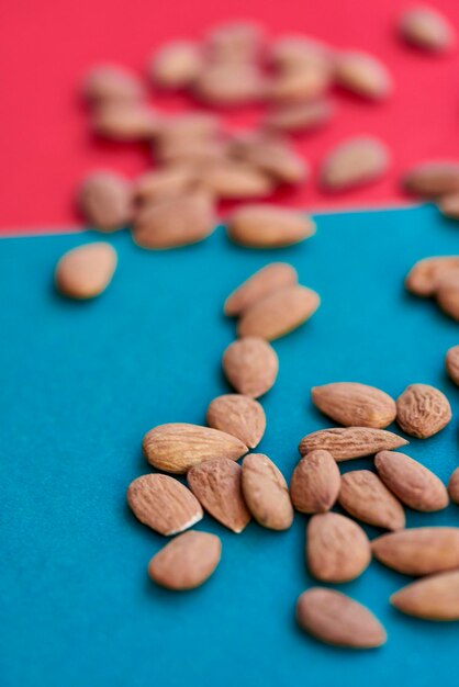 Close-up of almonds against two tone background