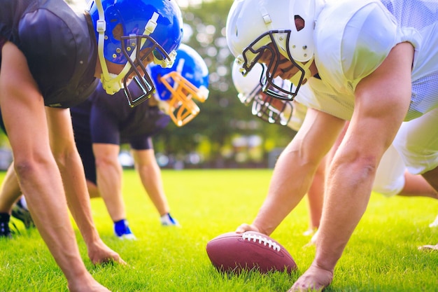 close-up of american football players on field