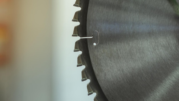 Close up of angle saw blade with copy space