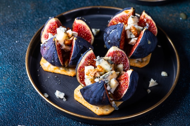 Close up appetizer with figs and blue cheese