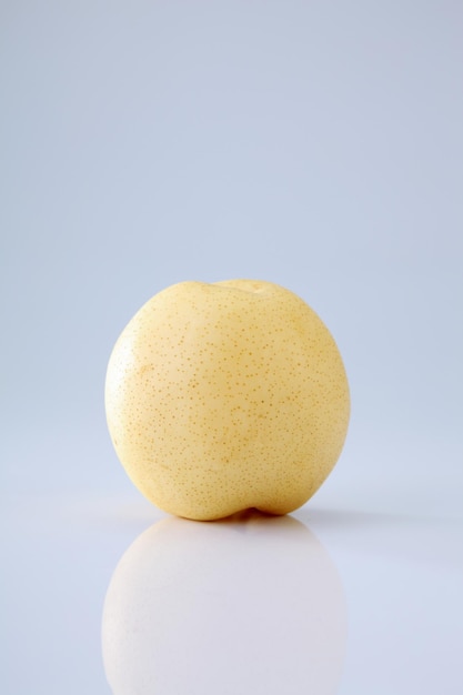 Close-up of apple against white background