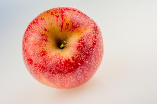 Close-up of apple against white background