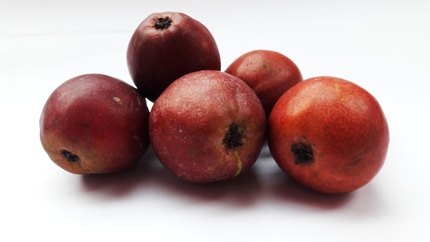 Close-up of apples on white background