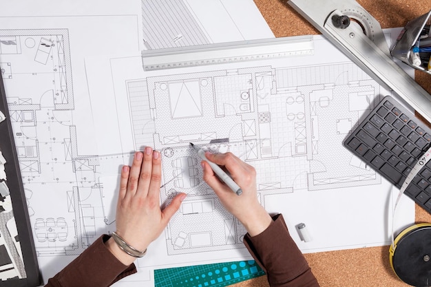 Close up of architect desk with blueprints. Business and creativity. Architecture job