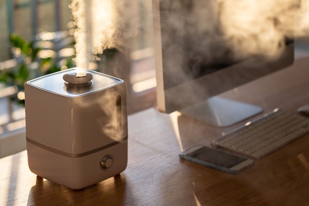 Close up of aroma oil diffuser on the table at home