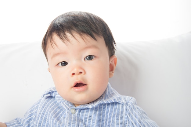 Close up asian baby face smiling 7 months old