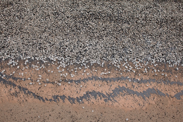 Close-up asphalt at the road under construction.