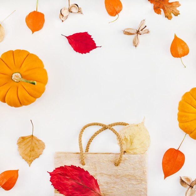 Close-up of autumn leaves on table