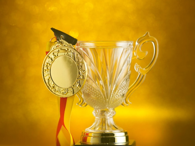 Close-up of awards against golden background