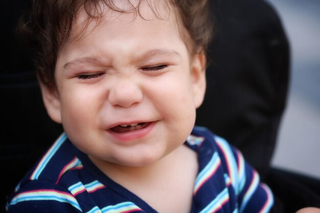 Close-up of baby boy crying
