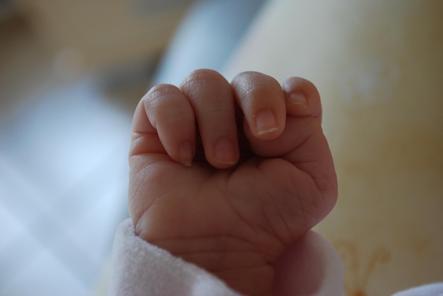 Photo close-up of baby hand