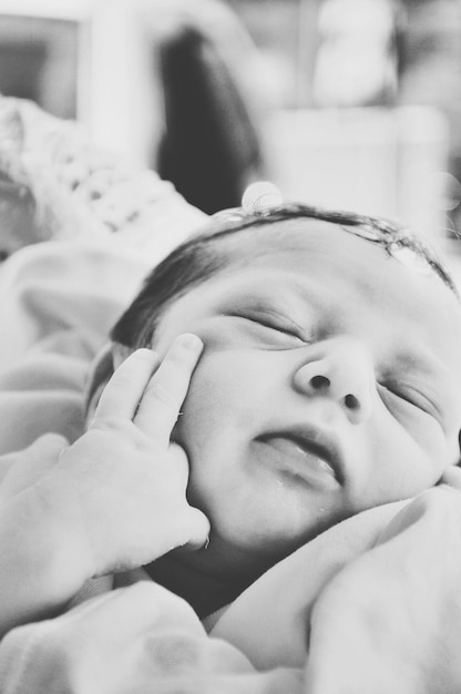 Photo close-up of baby sleeping