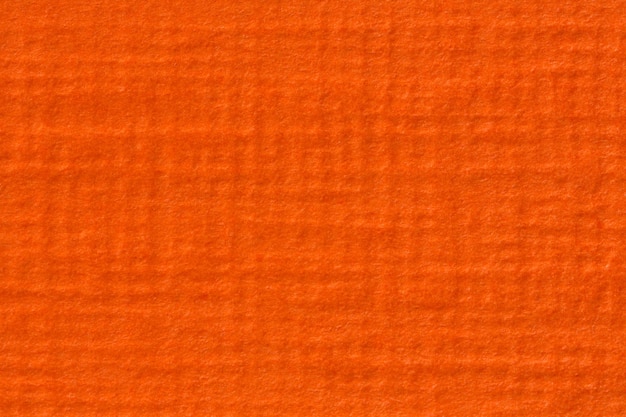 Крупный план оранжевого фона бумаги