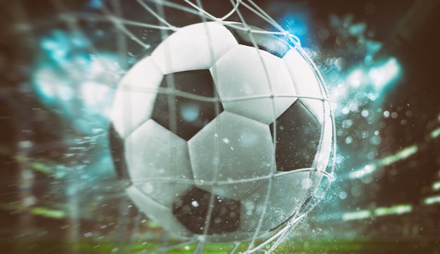 Close-up of a ball entering the net in a football match