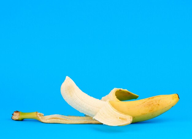 Close-up of bananas against blue background