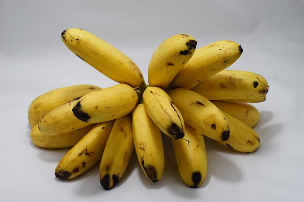 Close-up of bananas against white background