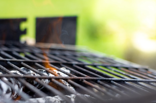 Close up of Barbecue Grill with Fire on Open Air Fire flame