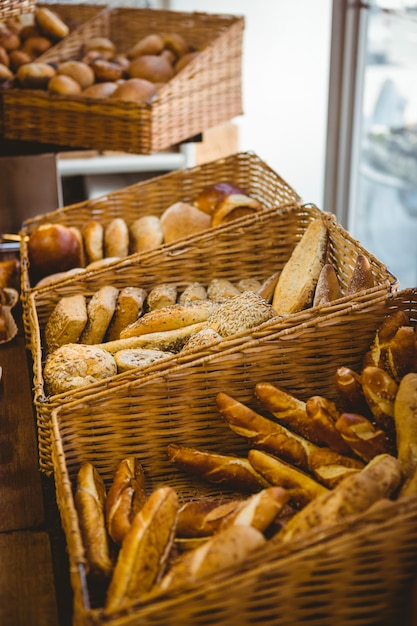 Close up of basket with fresh bread at the bakery