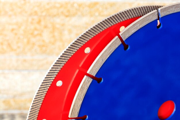 Close-up of basketball hoop against blue sky