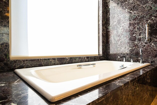 Close-up of bathtub in bathroom at home