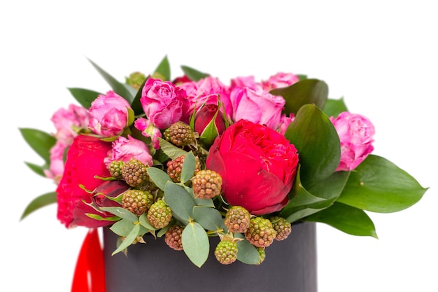 Close up of beautiful bouquet of pink and red roses isolated on white background. Valentines and anniversary concept