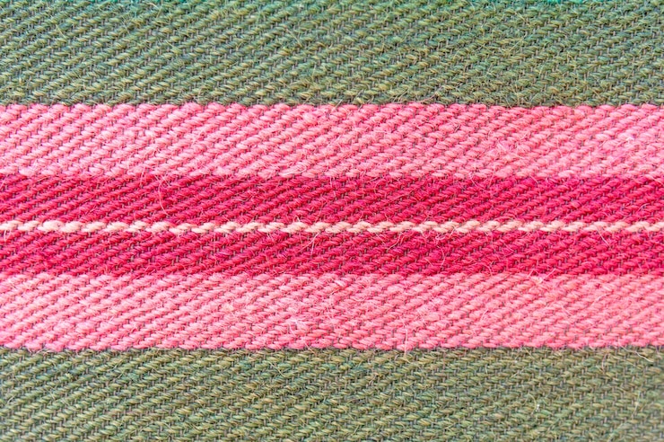 फोटो close up of beautiful colorful hand made motley rug or carpet