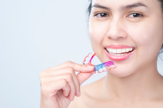 Close up beautiful teeth woman  with braces teeth 