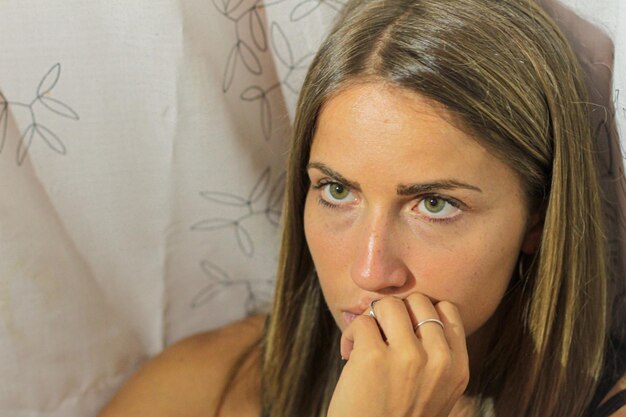 Close-up of beautiful woman looking away