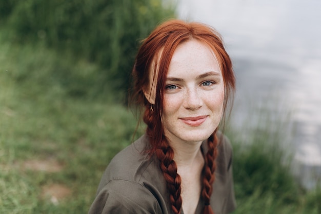 Close up beautiful woman portrait natural face freckles lifestyle girl with pigtails