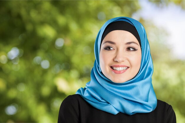 Close-up Beautiful Young Muslim Woman on  background