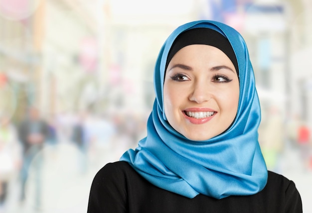 Close-up Beautiful Young Muslim Woman on  background