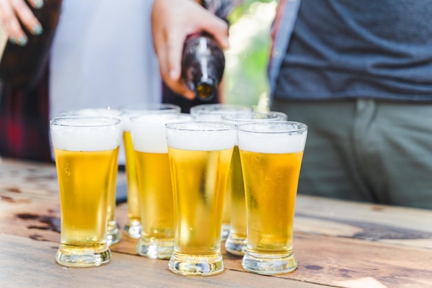 Close-up of beer glass on table