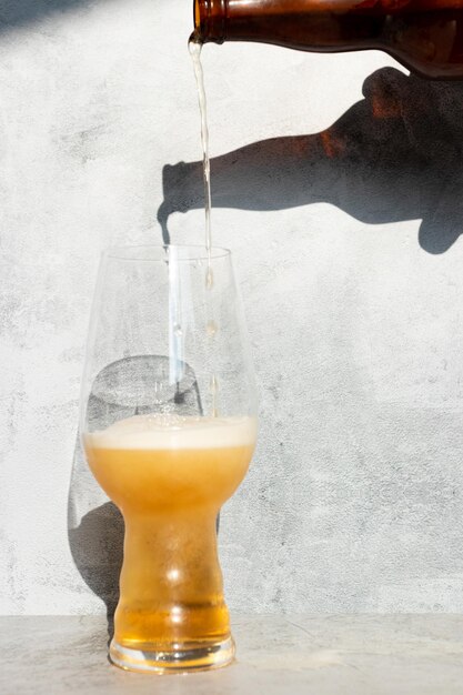 Close-up of beer glass on table