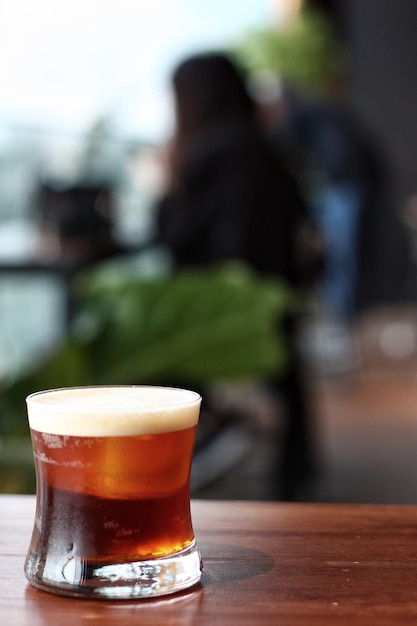 Close-up of beer in glass on table