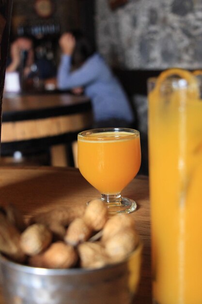 Close-up of beer in glass on table