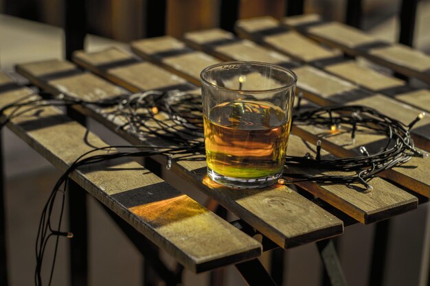 Photo close-up of beer in glass on table