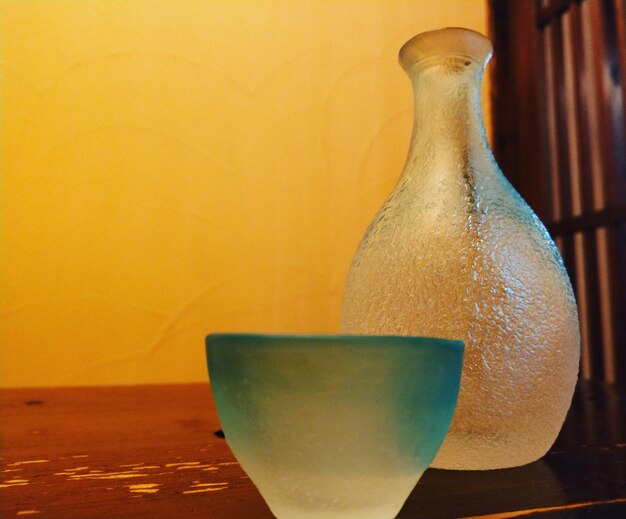 Close-up of beer glass on table